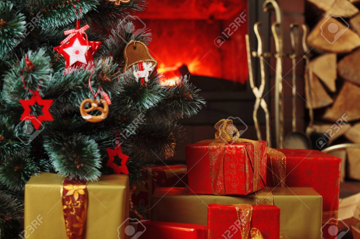 Christmas Presents Under The Christmas Tree On The Background Of A