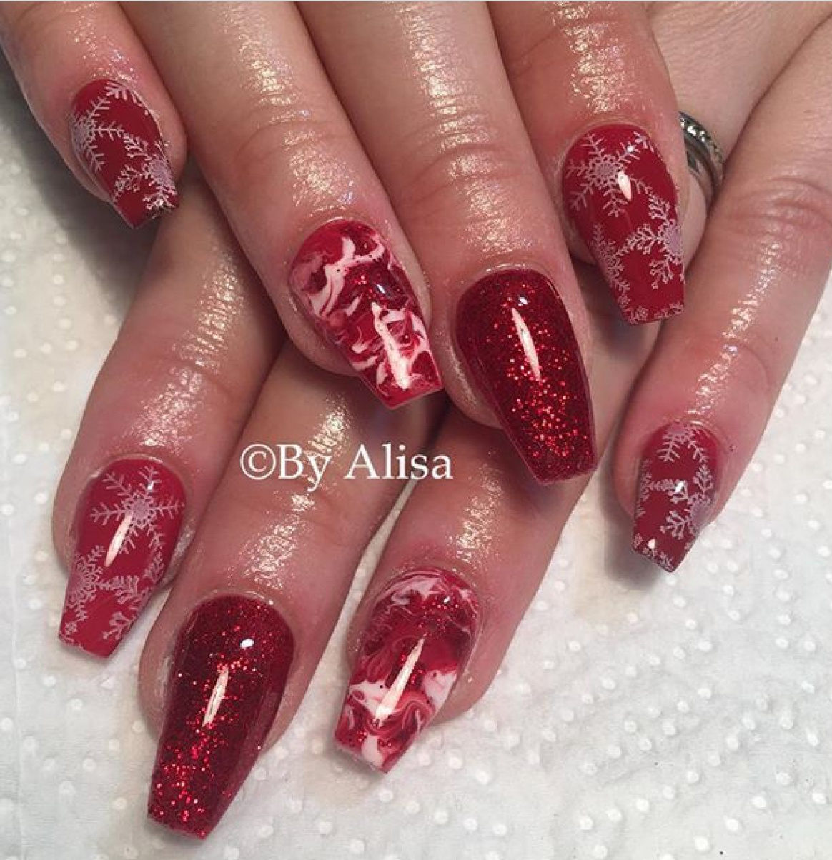 Festive Christmas Nails with Snowflake Stamps and Glitter