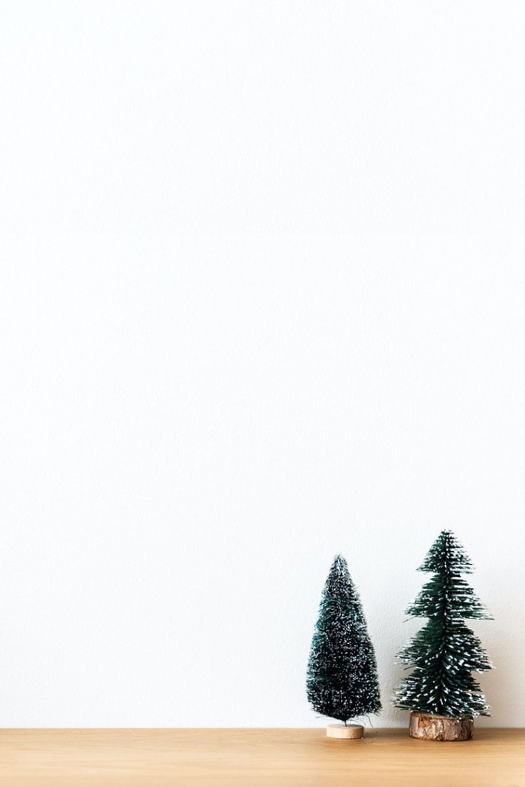 Festive Mini Christmas Trees on a Background