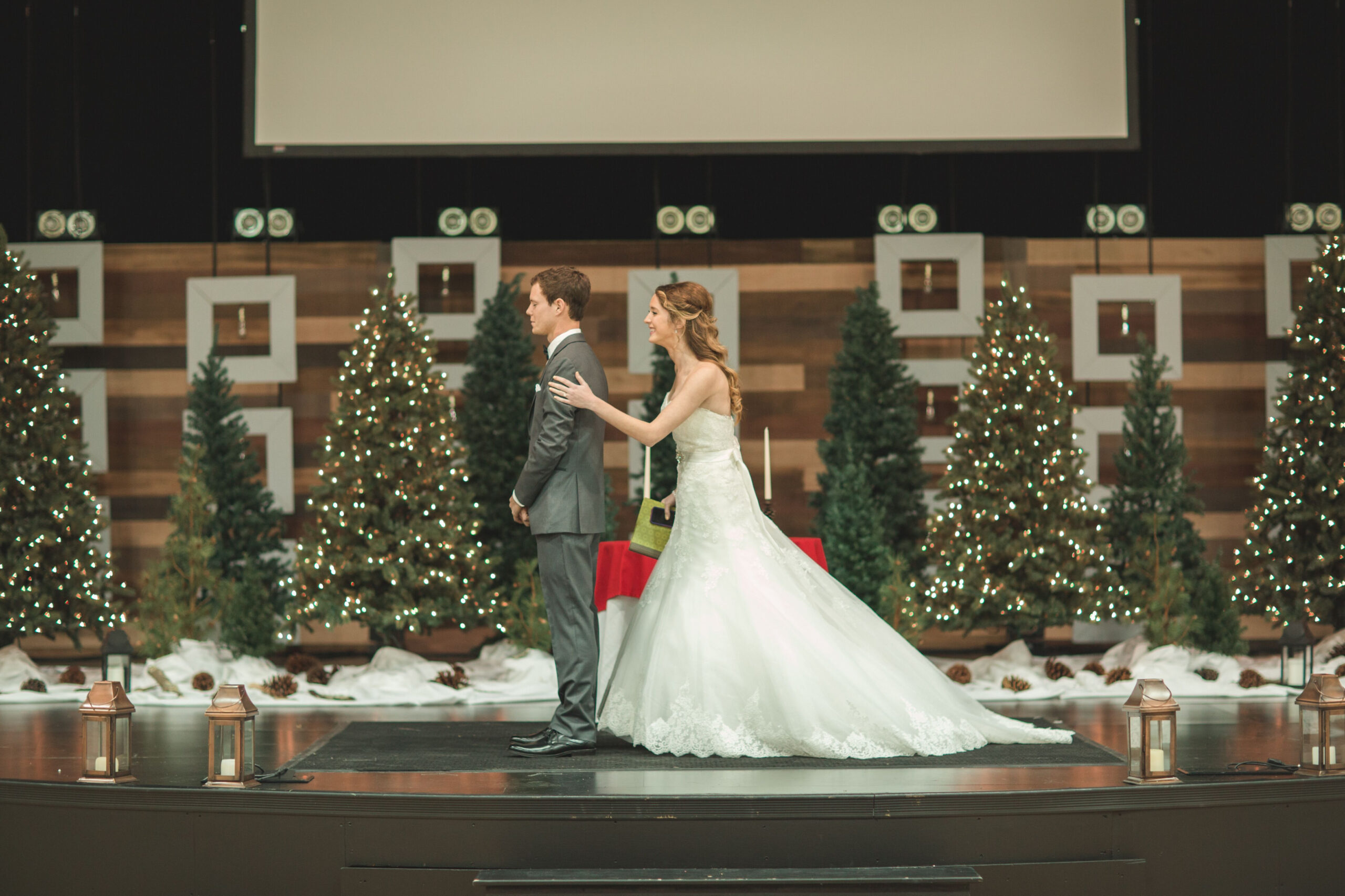 First Look With Christmas Tree Backdrop