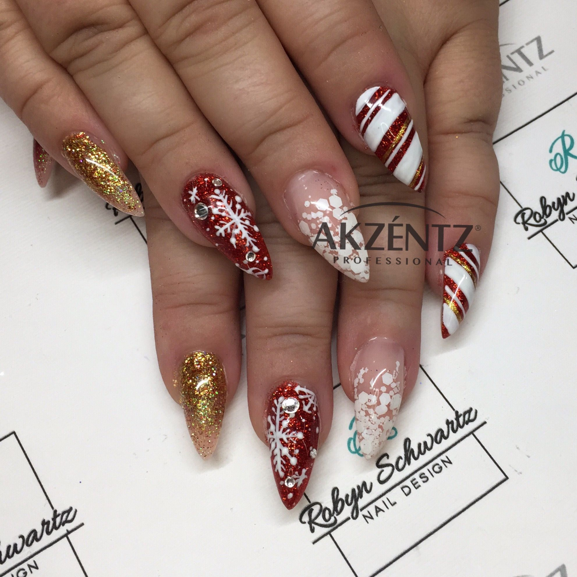 Snowflakes and Christmas glitters on almond gel nails  Christmas