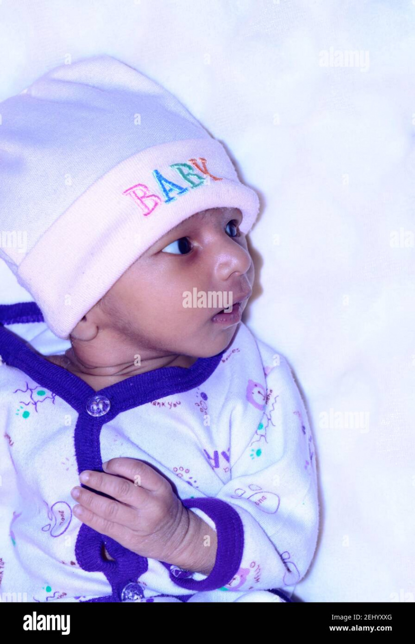 Closeup beautiful portrait of cute Indian newborn baby boy in