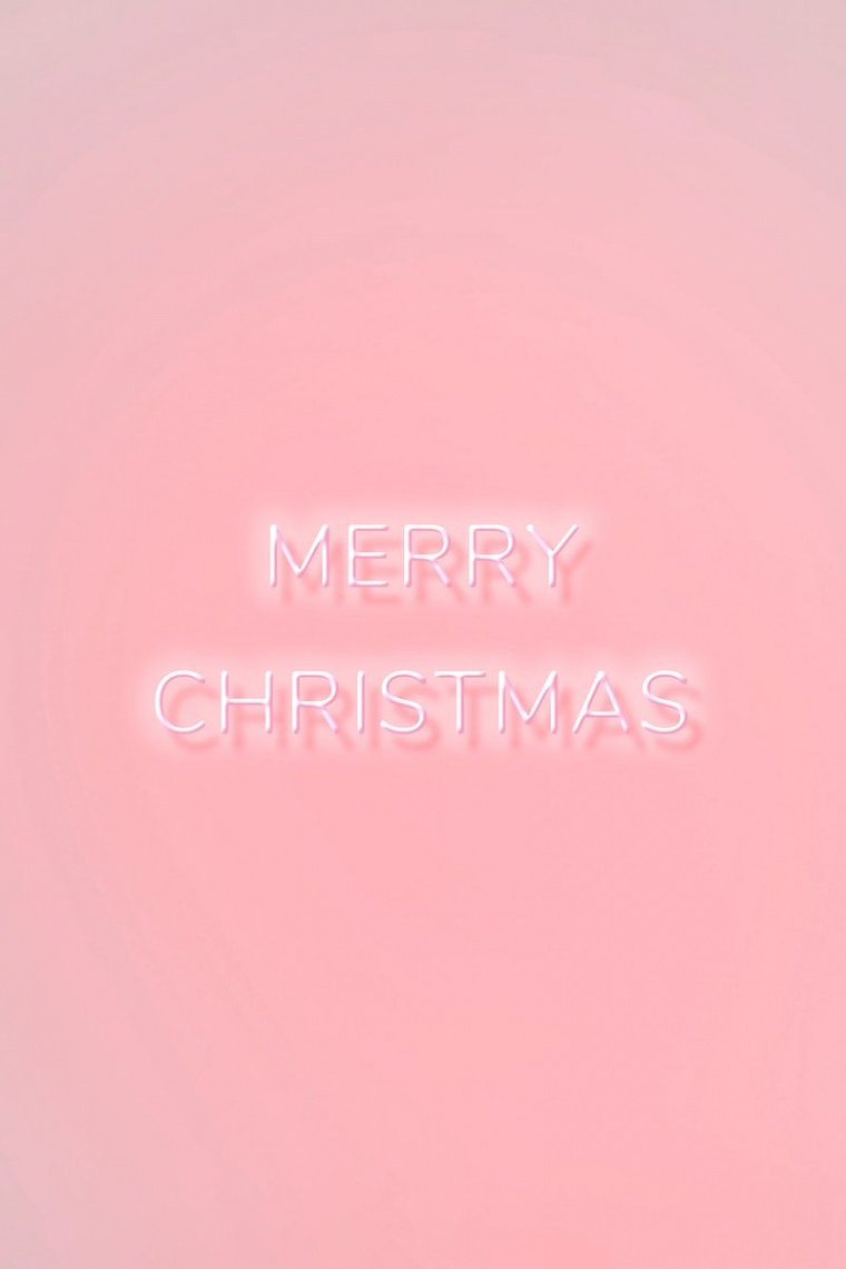 Merry Christmas neon word typography on a pink background  free